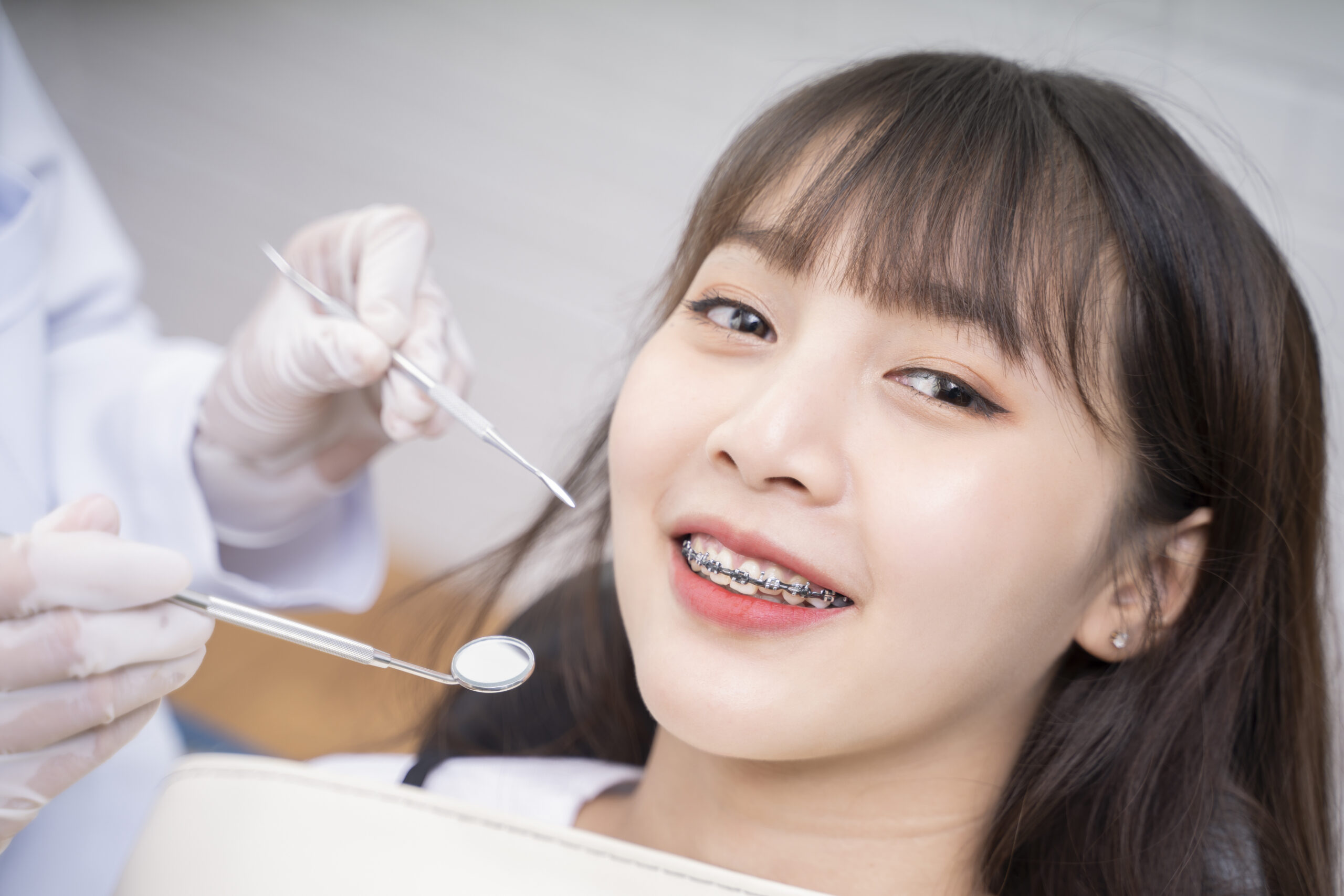 woman getting the orthodontic treatment
