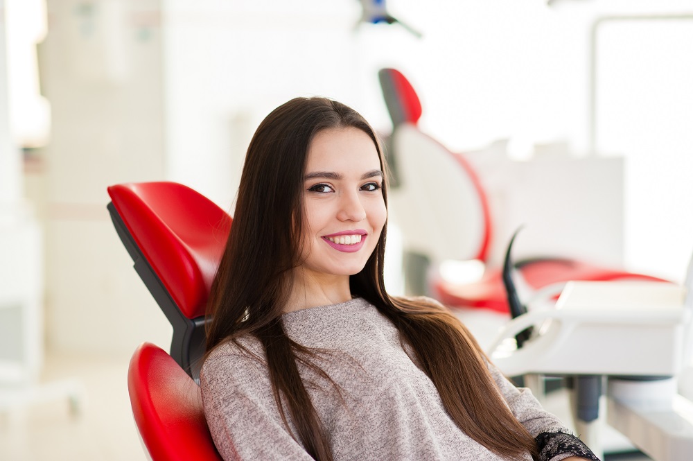 woman smiling after root canal treatment