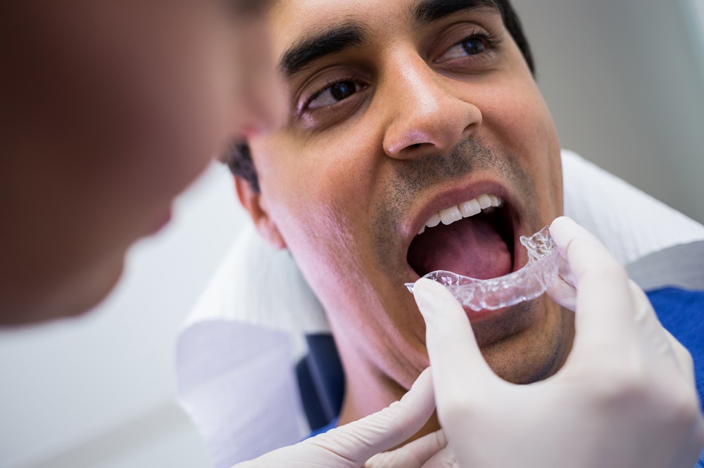 man wearing invisalign